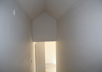 Angled drywall hallway